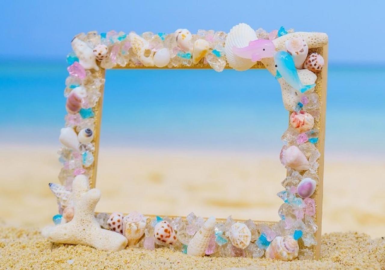 Hotel Monterey Okinawa Spa&Resort Onna Exterior foto A seashell frame