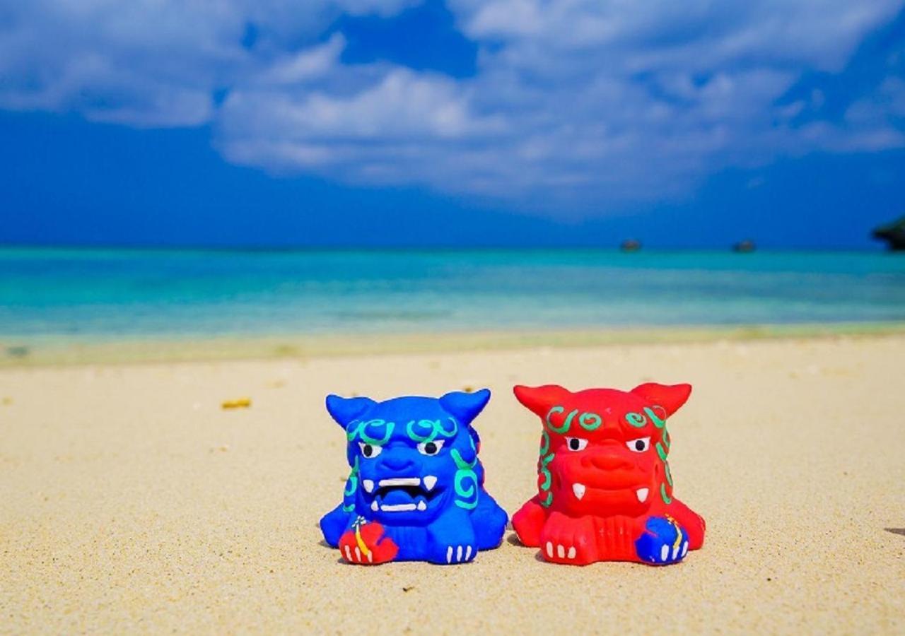 Hotel Monterey Okinawa Spa&Resort Onna Exterior foto Shisa statues on the beach of Okinawa